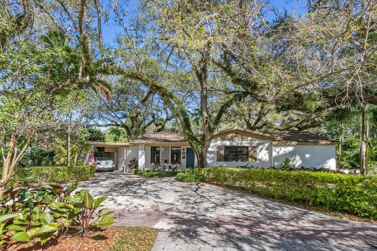 New South Coral Gables listing, fabulous 15,000 sq ft beautifully landscaped lot filled with gorgeous oak trees. Absolutely an adorable home with approximately 4 year old new septic/drain field, remodeled kitchen with gas stove and stainless steel appliances, beautifully remodeled bathrooms and new plumbing in and out. Very nice laundry room with built in cabinetry and stacked front load stainless steel washer and dryer. Just wait until you see this beautiful large property close to Sunset Elementary, restaurants and shopping.