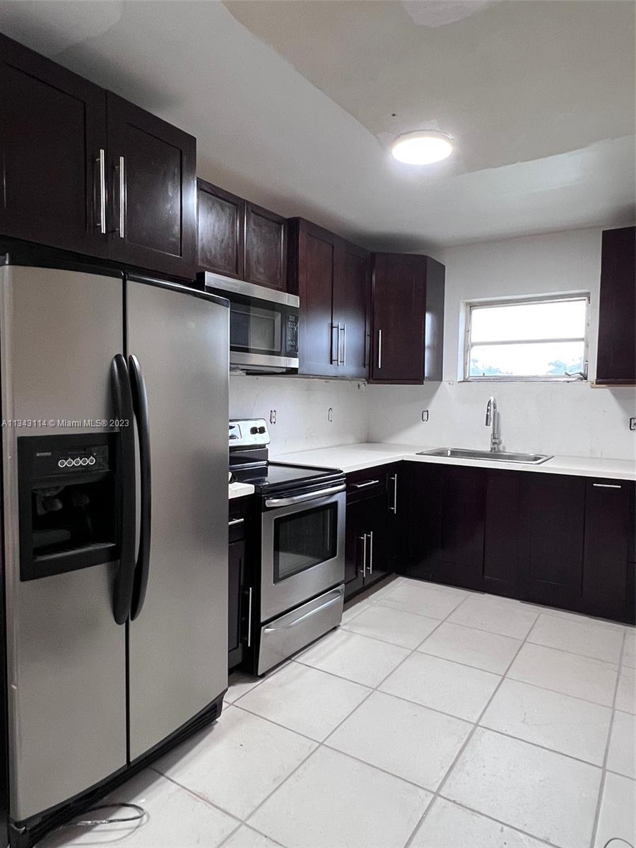 Fourplex for Sale. Newly remodeled. The property has a triplex in the front and a house in the back, both properties are in the same folio, and both properties have different addresses. The triplex has 2 -2/1, and a 1- 1/1, the house in the back is a 3/2. All units are currently rented. Please Do Not disturb tenants. CASH ONLY. All A/C units  inside and out are 2 years old, washer-dryer inside each unit, all bathrooms and kitchens were updated, the roof is 3 years old. CASH ONLY Cap Rate of 7.50%, more pictures coming soon. FOR PROPERTY SHOWINGS, A SIGNED CONTRACT OFFER MUST BE SUBMITTED FIRST WITH PROOF OF FUNDS. If Sold At Full Price 4% Commission