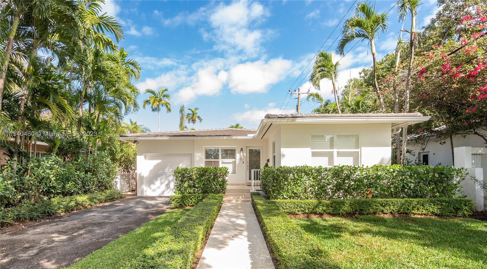 Note to agents and buyers:  we will be presenting all offers that have come in on Perugia on Thursday evening, February 23rd. Don't procrasinate.  Extensively updated 3 bedrm/2 bath home on a 50 x 100-ft lot south of US#1 and west of LeJeune Roadm   New kitchen, impact windows, new flooring & new roof. Laundry room with additional third bath. This home is ready to move into and will sell quickly. One of few homes in South Gables in this price range so see it soon.  The owner took out a small patio and replaced it with a covered gazebo, outdoor lighting, and artificial turf, and has made a huge entertainment area in the backyard. Sunny and bright. Easy to show. Multiple offers are expected for this charming home in South Gables.