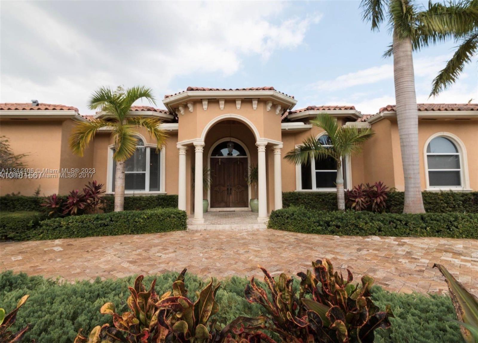 Escape the Miami hustle and bustle in this one-of-a-kind tropical oasis. This spacious, 6 bedroom, 4 bath estate home features a majestic living room with coffered ceilings and fireplace, formal dining room with bay window, and a large kitchen that opens up to the family room with beautiful views of your outdoor botanical garden. Enjoy its oversized backyard featuring a resort-like pool with spa, pond, and expansive covered patio - an entertainer's dream. Perfectly situated between scenic Old Cutler Road and US-1, making it easy to get to nearby shops, restaurants, and highways. Minutes from Black Point Marina.