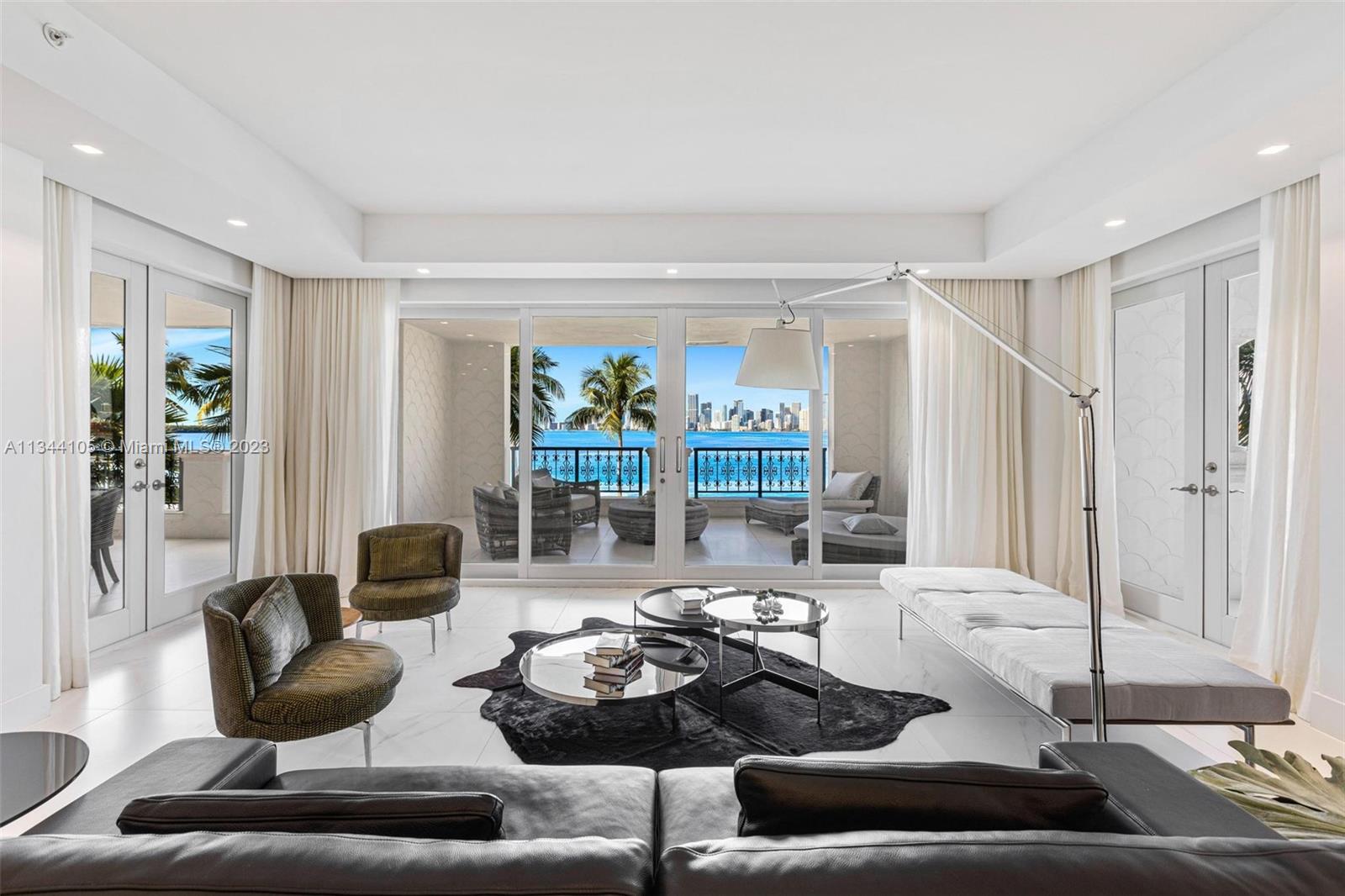 This stunning Bayview rental on Fisher Island has been completely renovated to perfection! It encompasses 3,550 sq. ft. interior, 4 bedrooms, 4.5 baths, expansive terraces overlooking the Miami Downtown skyline and Bay.  Features include an open layout with marble floors throughout, state-of-the-art kitchen and bathrooms, impact glass doors, spacious bedrooms with walk-in closets and many more features. Available starting now through December 15, 2023. Live the Fisher Island lifestyle in this exceptional offering!