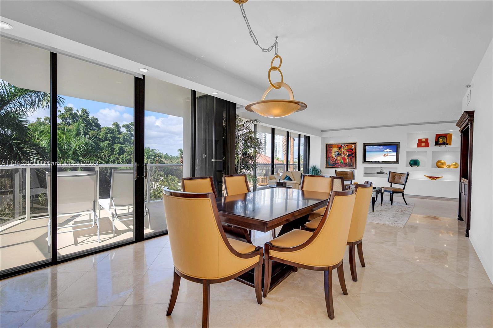 Dinning room with living room and great balcony to the left