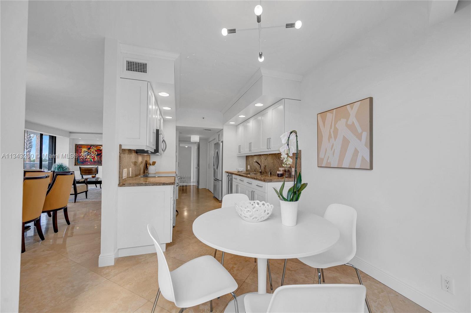 Ample kitchen with eat-in area