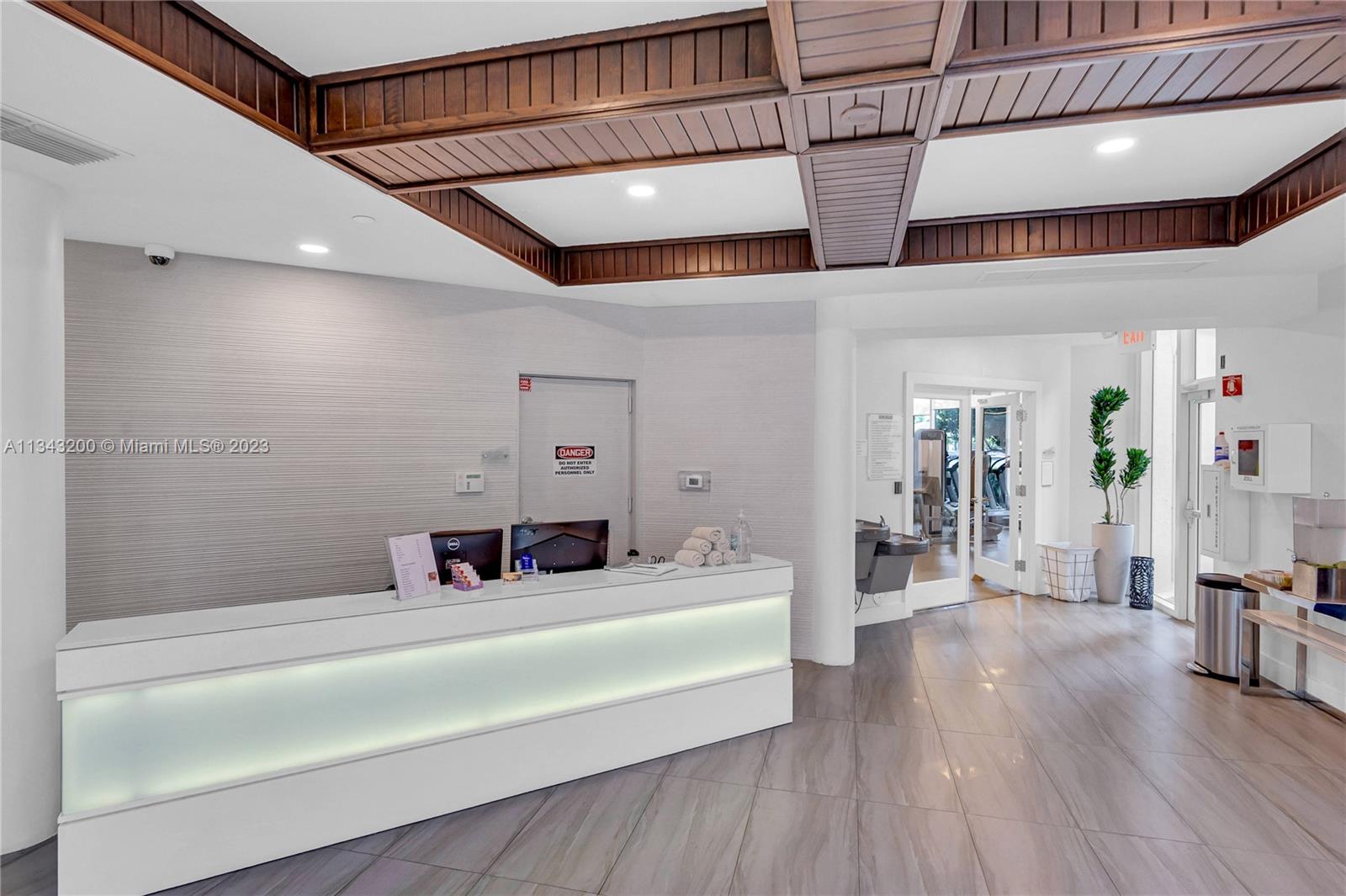 Entrance to spa area where you can schedule spa services, fully modern and equipped gymnasium, access nail salon, whirlpool, squash courts, separate men and women spas and more.
