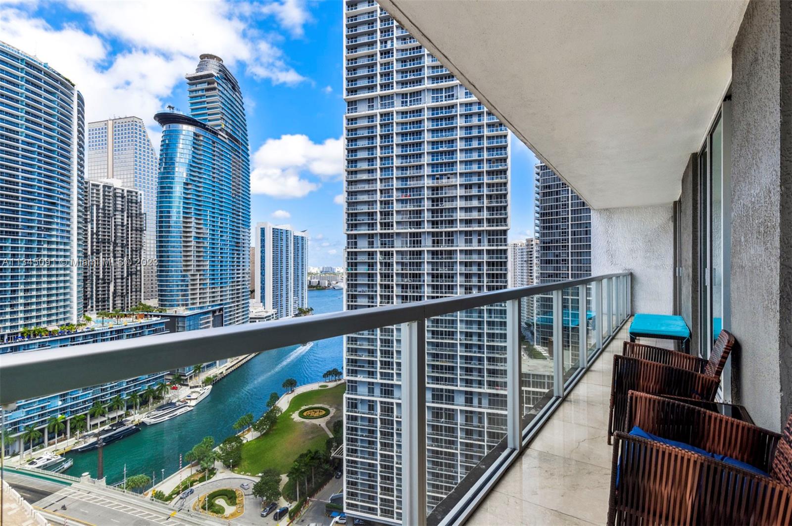 Spacious Luxury Apartment in the most desirable part of Miami's Brickell neighborhood, featuring stunning water views where the Miami River meets Biscayne Bay.  The apartment features two bedrooms, and two full-bathrooms, each with double vanity appointments, along with marble floors, an oversized balcony stretching the entire width of the apartment, and accessible from all rooms, and an open floor plan ideal for entertaining.  Enjoy prime, unobstructed water views from all rooms, and assigned parking.  Amenities: 42-floor Rooftop-Pool with views to Miami Beach, 11th floor rooftop pool, gym, and spa with sauna, steam room and jacuzzi Media and Sports Rooms.  Walking Distance to the top shopping, dining and nightlife in Brickell.  10 min to MIA and Miami Beach.  ** New Washer & Dryer**