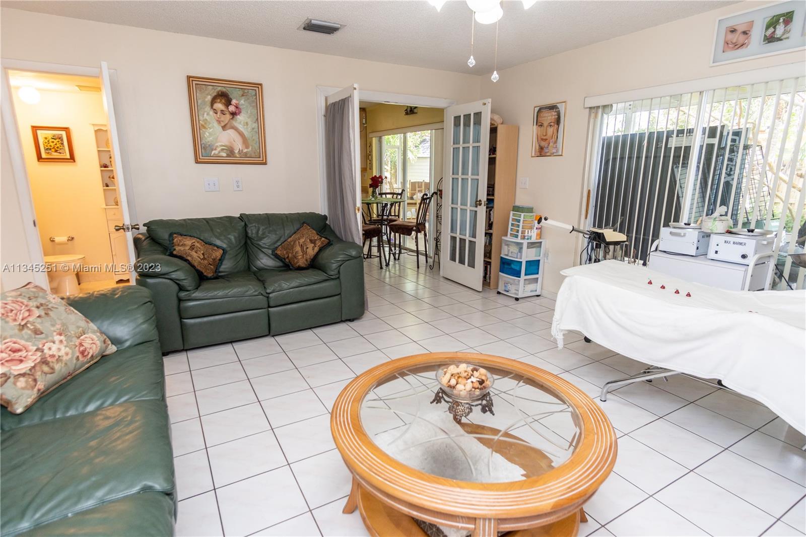 Family room with french doors/full shower bathroom