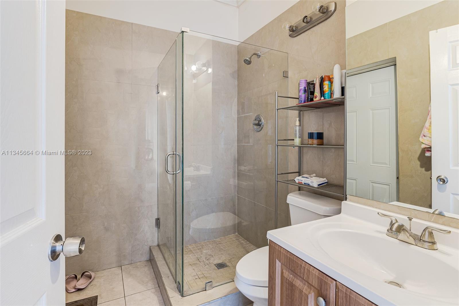 Downstairs bathroom located off the family room.