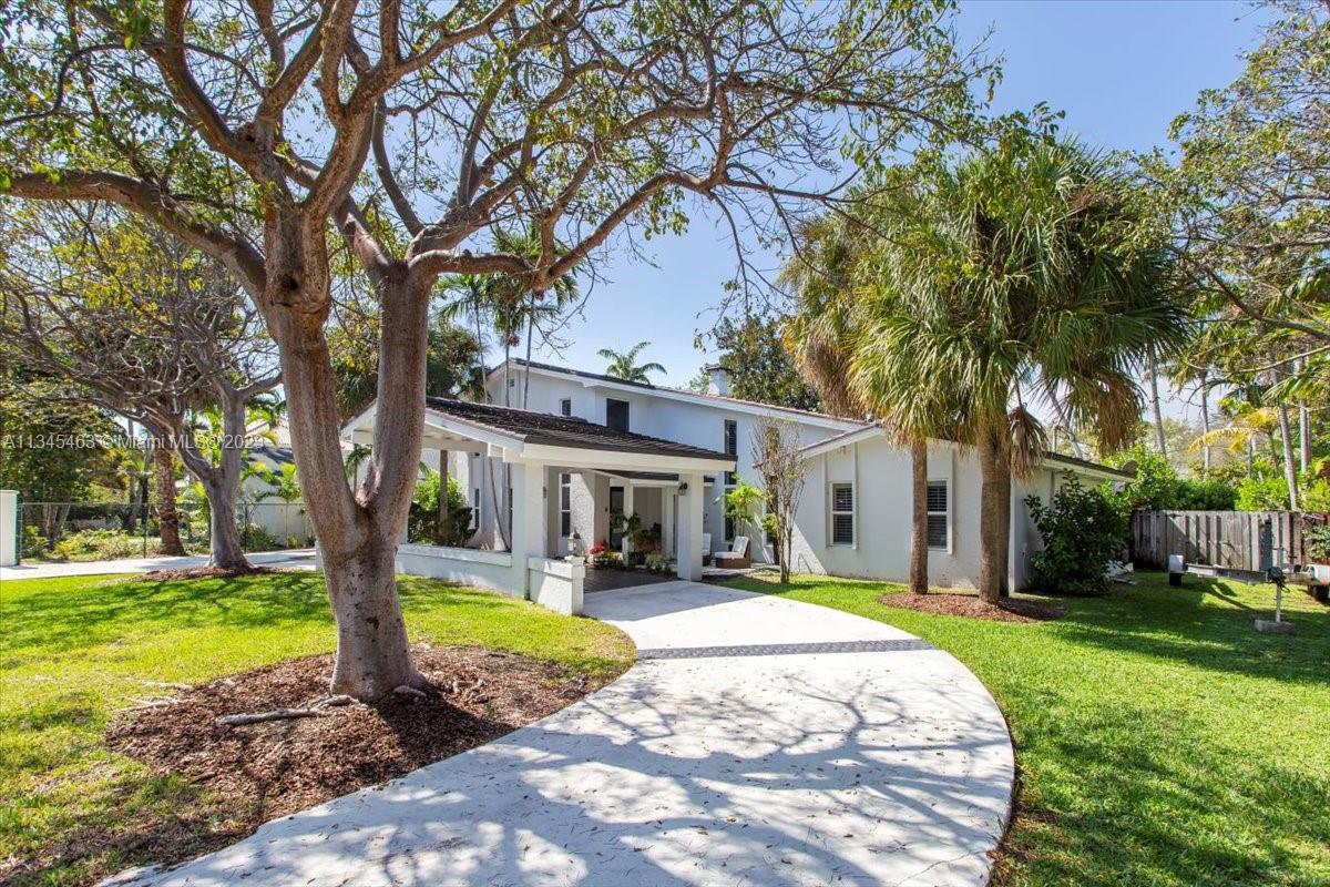 Enjoy the Miami Lifestyle all year round in this rare pool home in the Coral Gables Gated community of Kings Bay Estates. This large (3625 sq ft) renovated 5/3.5 bedroom/bath PLUS den gives you a smart floor plan that works for any family.  Spectacular Vaulted Wood Beam ceilings in the family room are framed by impact windows and doors.  The coral rock stone fireplace is striking.  Master Bedroom is downstairs and includes a sitting area/walk-in closet/beautiful bathroom. Deeded community boat ramp access with 8 slips for only owners. Please review the website for all the impressive attributes of what you will want to call home!  There is not anything else like this opportunity in Miami Dade-do not let it pass you by!