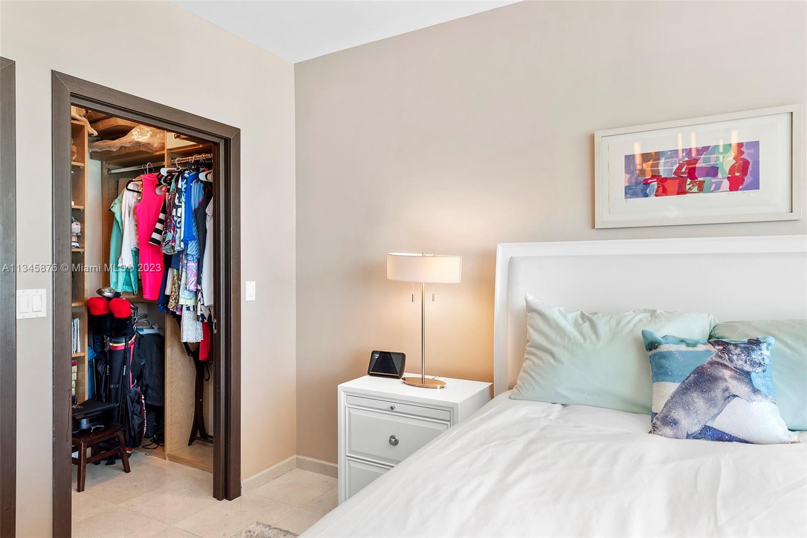 Closet with built-ins in secondary bedroom