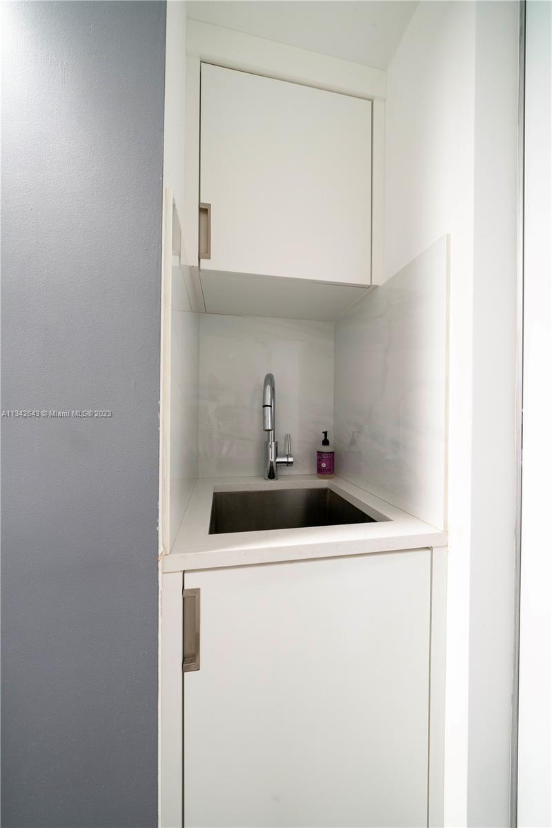 Laundry room with top-of-the-line Asko washer & dryer!