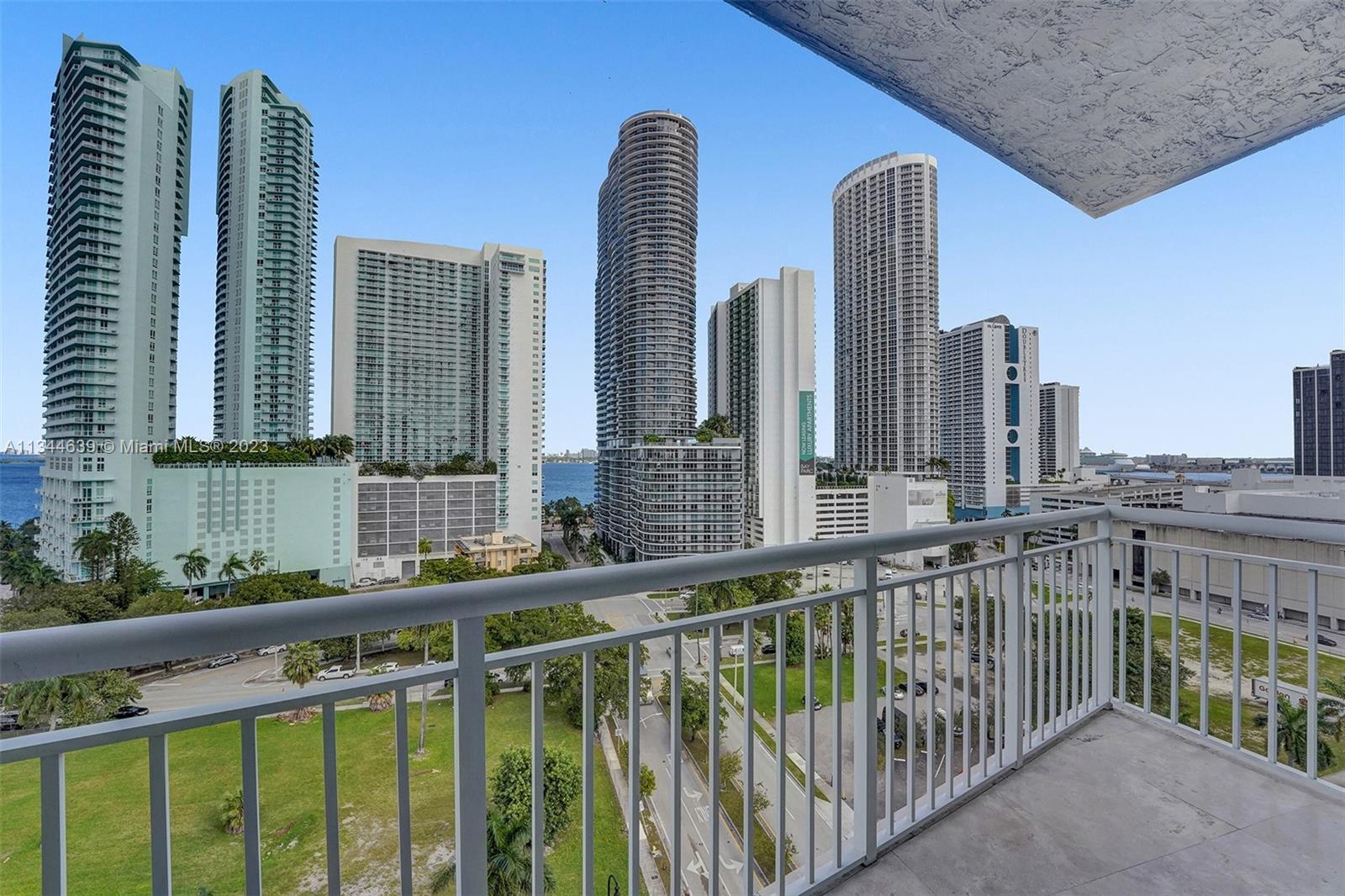 Beautiful corner 3 bedroom, 2 bathroom Edgewater condo with 2 assigned parking spots!  This unit has panoramic views of the bay, cruise ships and downtown Miami.  Features include travertine stone floors, white open kitchen with granite countertops and SS appliances, washer/dryer in unit, clubhouse, pool and 5-star fitness center. Located 1/2 block from Publix and Margaret Pace Bay Front Park with tennis, volleyball, basketball and doggy park.  Pets welcome.