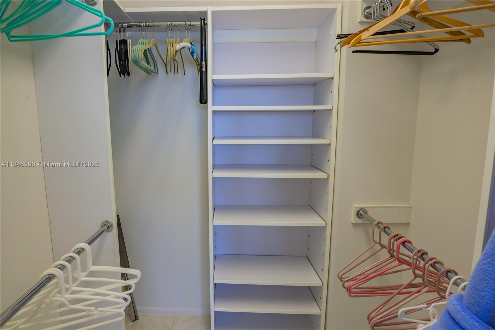 MASTER BEDROOM WITH CUSTOM BUILT IN CABINET DETAIL