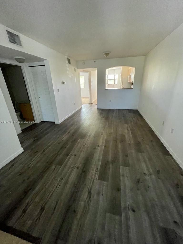Live in this spacious 2 bedrooms, 2 full bathrooms unit in The Courts at Bayshore II. Located on the second floor with beautiful back garden view, tile and carpet floors, central cooling, parking space across the unit and guest parking. The condo includes great amenities such as community pool, fitness centre, clubhouse and walking paths. Perfect for families. 24 hours security guard. Close to shops, services and schools.