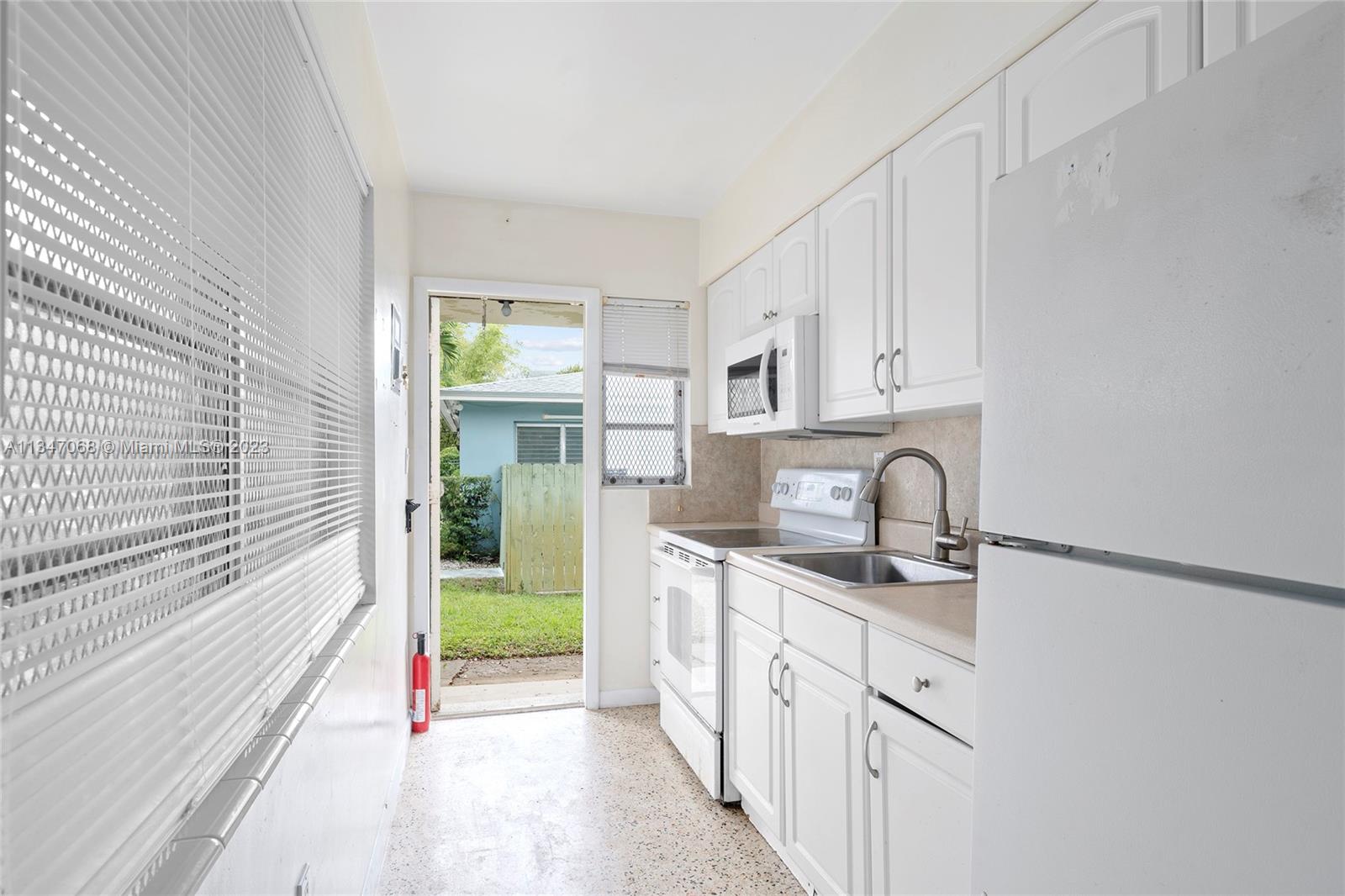 View of one of the kitchens.  Text agent for interior videos of each unit.