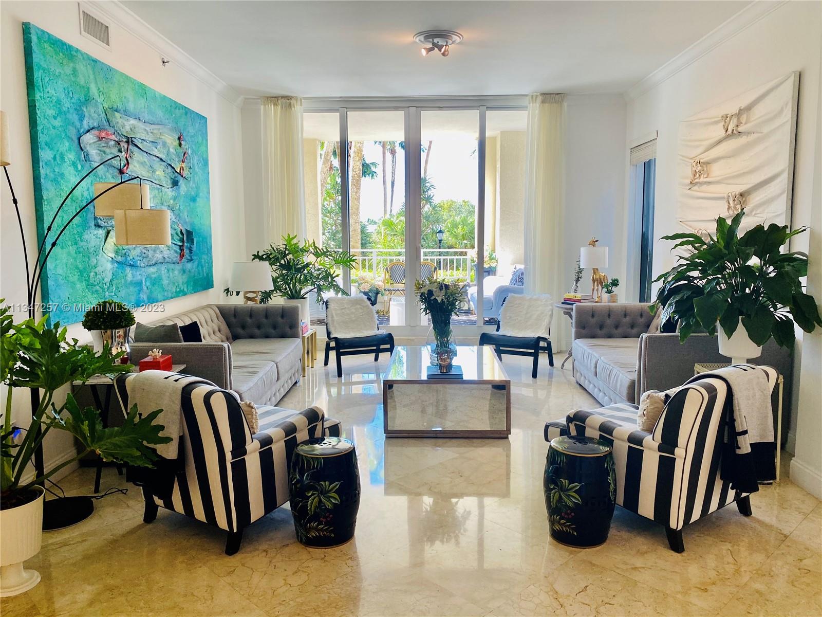 UNIQUE SPACIOUS OVER 3000+ SqFt ONE OF A KIND IN OCEAN CLUB 4.5 BTH/5 BD - (1 is a STAFF QUARTERS WITH BATHROOM) Also a DEN. LANAI UNIT WITH GARDEN VIEW. GROUND LEVEL CREATING A HOME SENSATION WITH LUXURY AMENITIES, STEPS FROM THE BEACH. OVERSIZED MASTER (FITS 2 KING BEDS). DESIGNER FINISHES, MARBLE TILE, BAMBOO WOOD FLOORS IN BEDROOMS & GRANITE KITCHEN COUNTERTOPS. LARGE BALCONIES, BREAKFAST ROOM, HIGH CEILINGS, CUSTOM CURTAINS AND BLACKOUTS. PRIVATE STORAGE & 2 COVERED PARKING SPACES, VALET, MAGNIFICENT GYM, CLUB, HAIR SALON, SPA, POOLS, TENNIS, KIDS PLAYGROUND, BEACH SERVICE, RESTAURANTS AND MUCH MORE! ANY SIZE BABY STROLLER AND HANDICAPPED ACCESSIBLE. No stairs or elevators inside or to enter the unit. Furniture not included- negotiable with tenant.