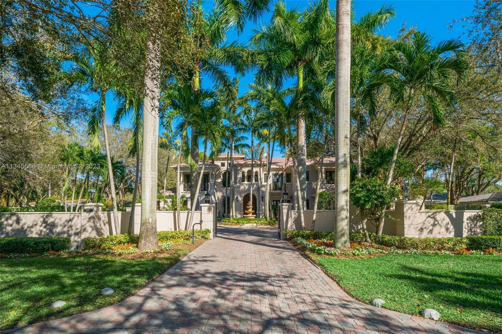 This stunning 6,626 sq ft home with 6 bedrooms, 7 bathrooms and 1 half-bathroom is on a lushly landscaped 47,916 sq ft lot in the desirable Pinecrest community. The grand entrance area features a foyer with soaring ceilings, marble flooring and beautiful natural light. Living areas in the open floor plan include a formal living room and fireplace, formal dining room, gourmet kitchen, and a family room that overlooks the magnificent backyard oasis. The main suite on the ground floor provides a private retreat and a luxurious spa-like bathroom with double vanities. Additional features include an elegant library, large covered terrace, sparkling pool, jacuzzi, playground and a summer kitchen. A unique estate perfect for family fun and​​‌​​​​‌​​‌‌​‌‌‌​​‌‌​‌‌‌​​‌‌​‌‌‌ recreation.
