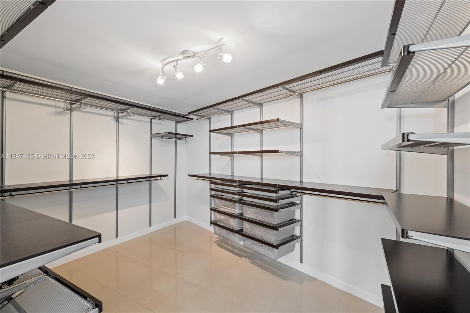 Large Master closet with built in closet system!