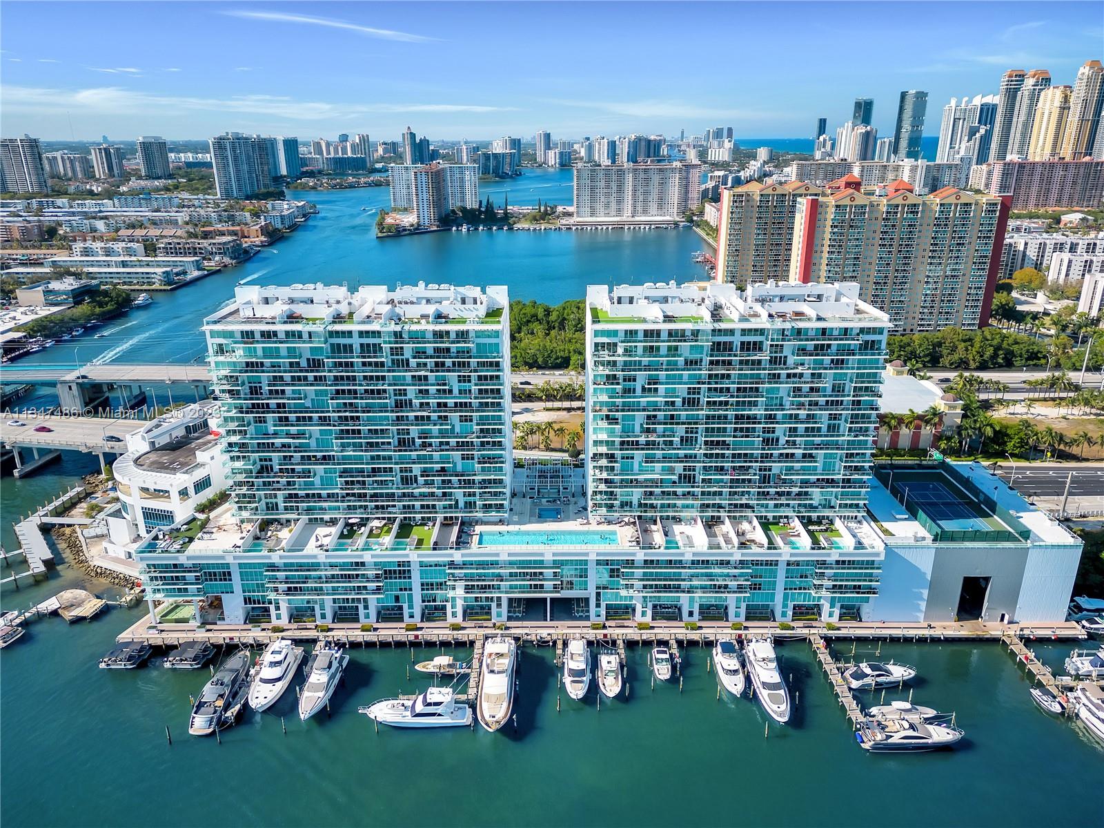 Spectacular corner unit- flow through floor plan, direct view to the bay and marina. 400 Sunny Isles offers a resort life style and features. a dry and wet marina, state of the art gym and spa, one clay tennis court, bay front pool, sauna, steam room, outside Jacuzzi, pool bar, full time concierge. 
The unit has Italian porcelain floors, Italian kitchen cabinets. and European appliances. MUST SEE. One of the best floor plans in the building and one of the best views!!