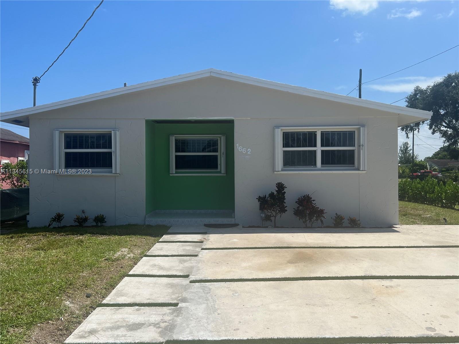 Photo 1 of 1662 NW 152nd Ter in Miami Gardens - MLS A11345615