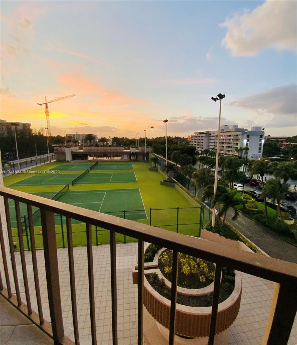 Tennis court & city view from second balcony
