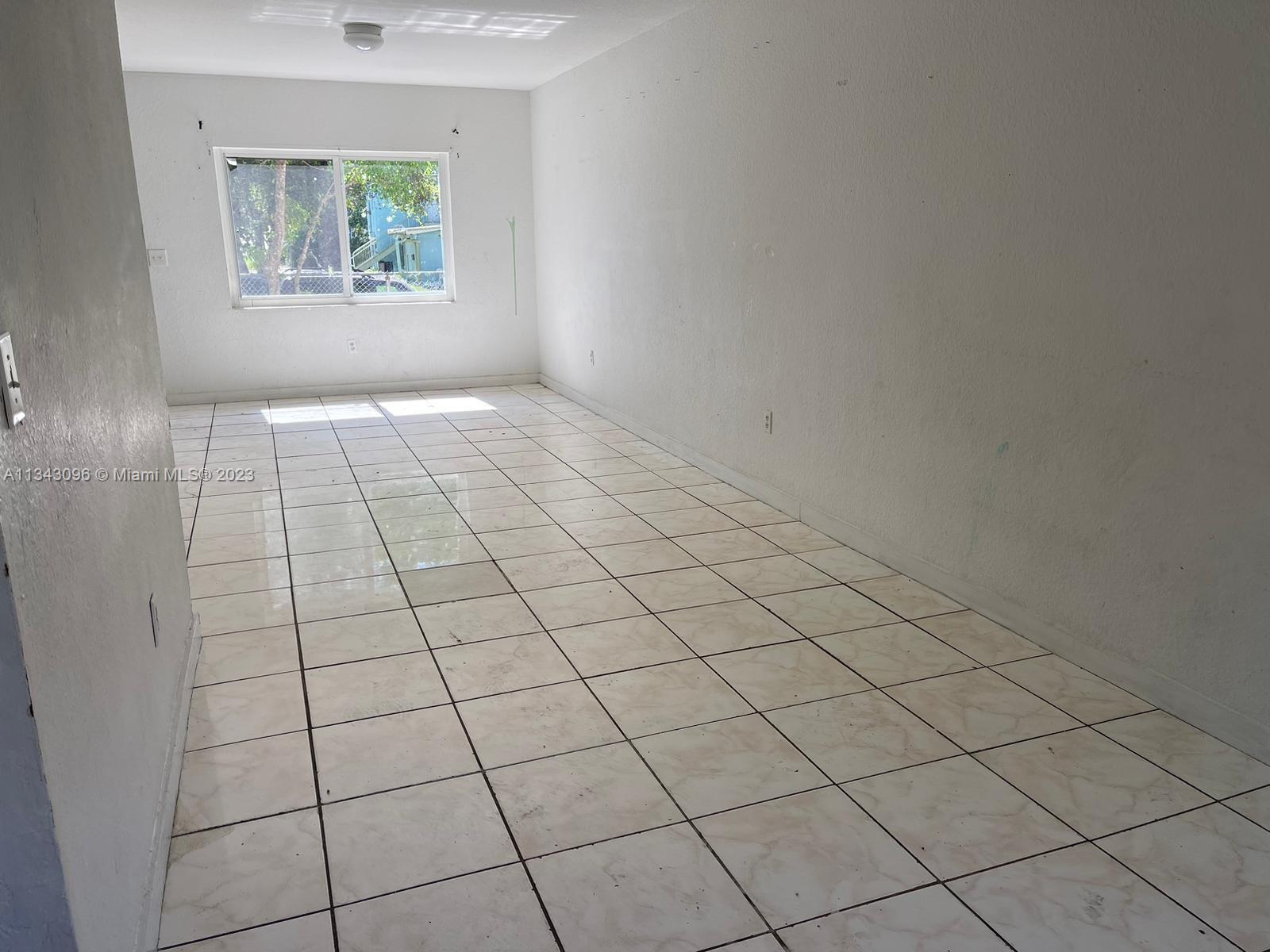 Photo 2 of 415 83rd St in Miami - MLS A11343096
