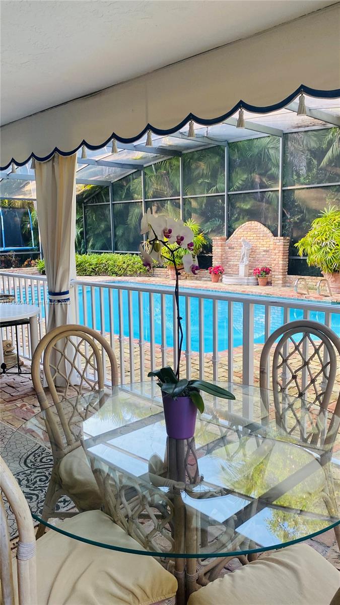 pool and large covered porch