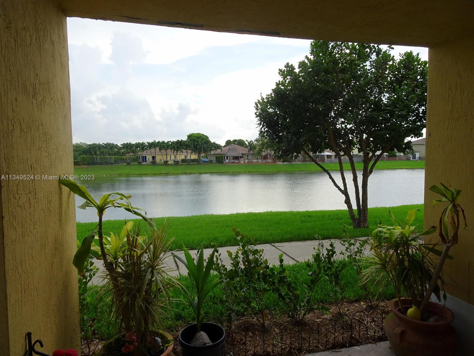 Great Location, near FL Turnpike.  Beautiful & Relaxing lake view 2/2 apartment on first floor, covered terrace, featuring 2 master bedrooms with split layout for privacy and full bath accessible inside rooms.  Lake view from practically everywhere, 2 assigned parking, upgraded kitchen with tastefully selected granite counter tops, impact glass for storm protection, fire protection sprinkler ceiling system in condo, crown moldings, outside storage private room, nice laundry inside with full size washer and dryer, facing west for nice sunsets.  Just a few minutes from the Black Point Marina.  Call me for private tours, will not last.