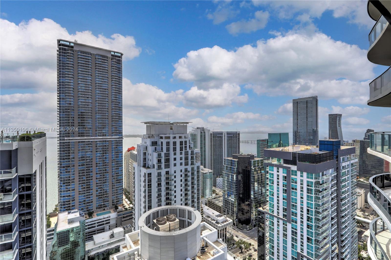 Spectacular penthouse in Brickell Flatiron, still the newest building in Brickell developed by Ugo Colombo. Quick walk to shopping & dining at Mary Brickell Village and Brickell City Centre.  PH 5103 offers panoramic bay & skyline views with 10ft floor to ceiling windows. Italian porcelain tile flooring by Casalgreande Padana. European-style kitchen by Snaidero w/ Miele appliances. The 64th floor “Sky Club” amenities include a fitness center w/ pilates & yoga room, pool w/sunrise to sunset views and a spa. Other amenities in the building: club room, lounge, children’s playroom, 18th floor lap pool, billiards room, movie theater. The Flatiron has everything you could want and more!