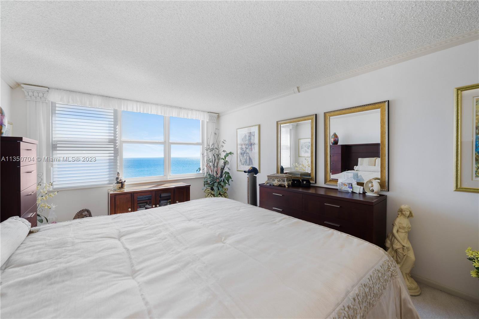 Primary bedroom w/ direct ocean view