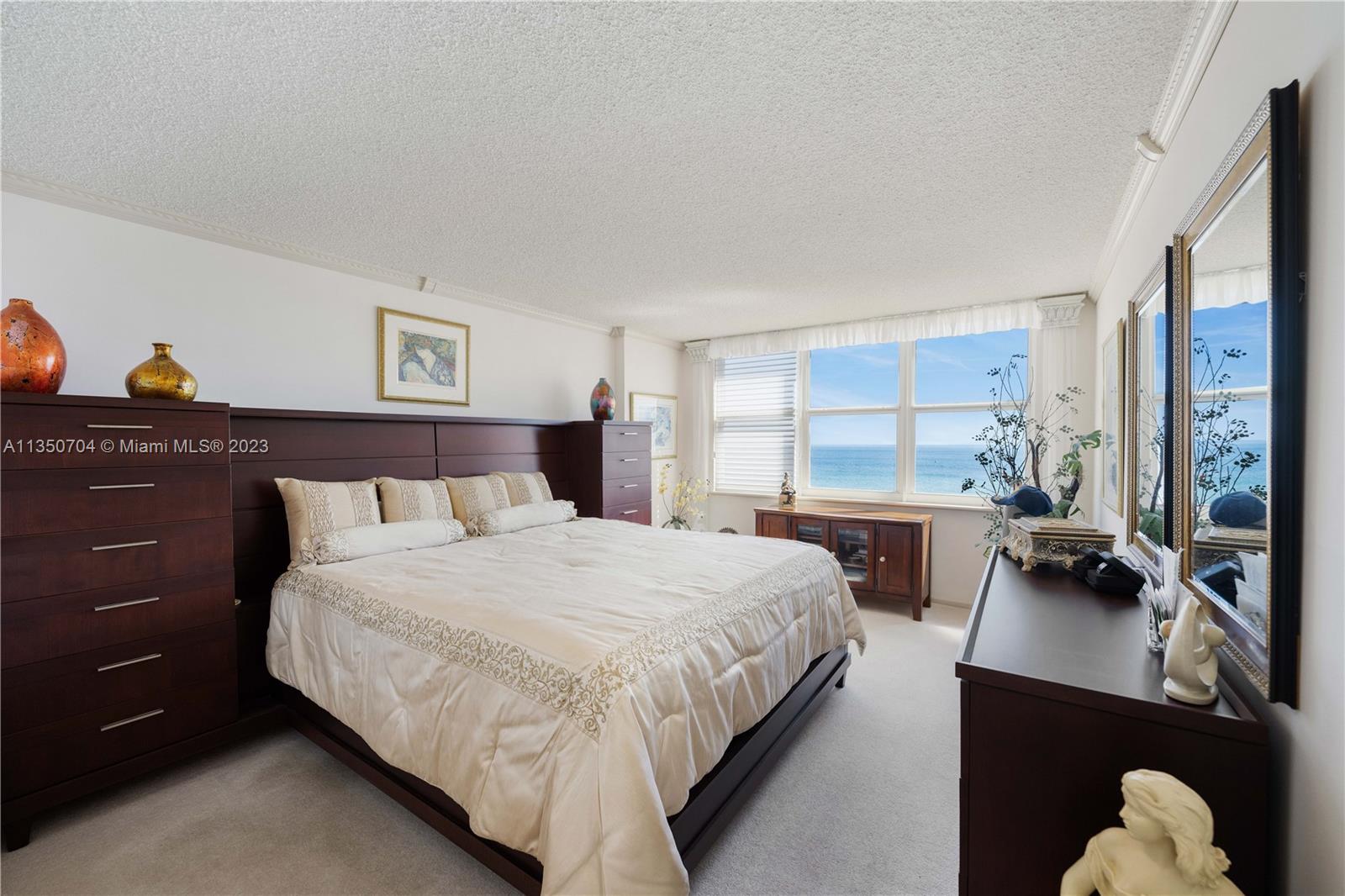 Primary bedroom w/ direct ocean view