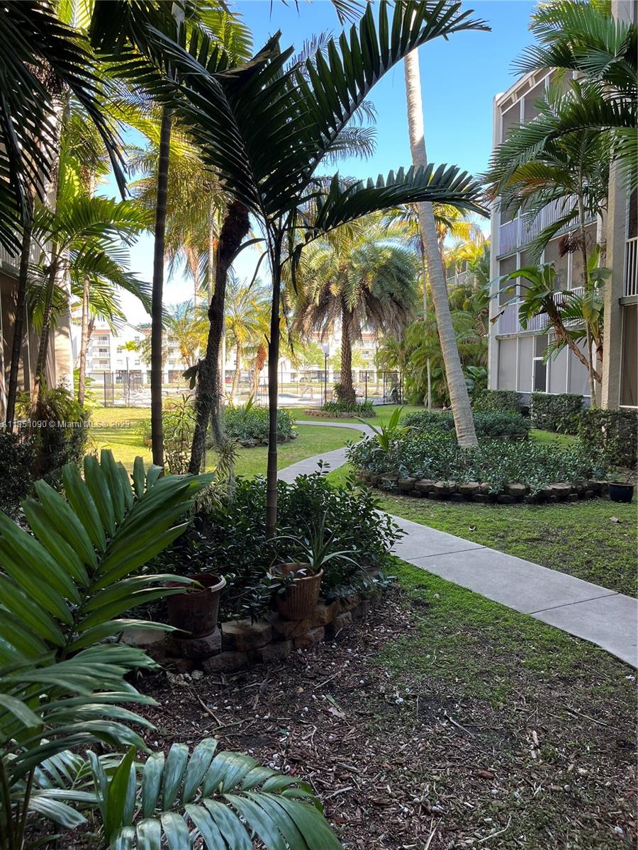 This spacious 2/2 is located in The Cove, a desirable waterfront condo community in Cutler Bay. The living/dining room and primary bedroom area lead to a balcony with a garden view. The unit is tiled throughout and boasts lots of natural light, closet space, open areas, and plenty of kitchen space to accommodate a breakfast nook.  The gated community features an elevator, an assigned parking space (conveniently located right at the entrance of the bldg), plenty of visitor parking spaces, a swimming pool, a laundry facility, and water views. AC replaced in late 2020, Water Heater in June 2017. Close to Black Point Marina, schools, and shopping, this unit is priced right for an investor or first-time home buyer. It is ideal for anyone wanting to customize and update it to make it their own.