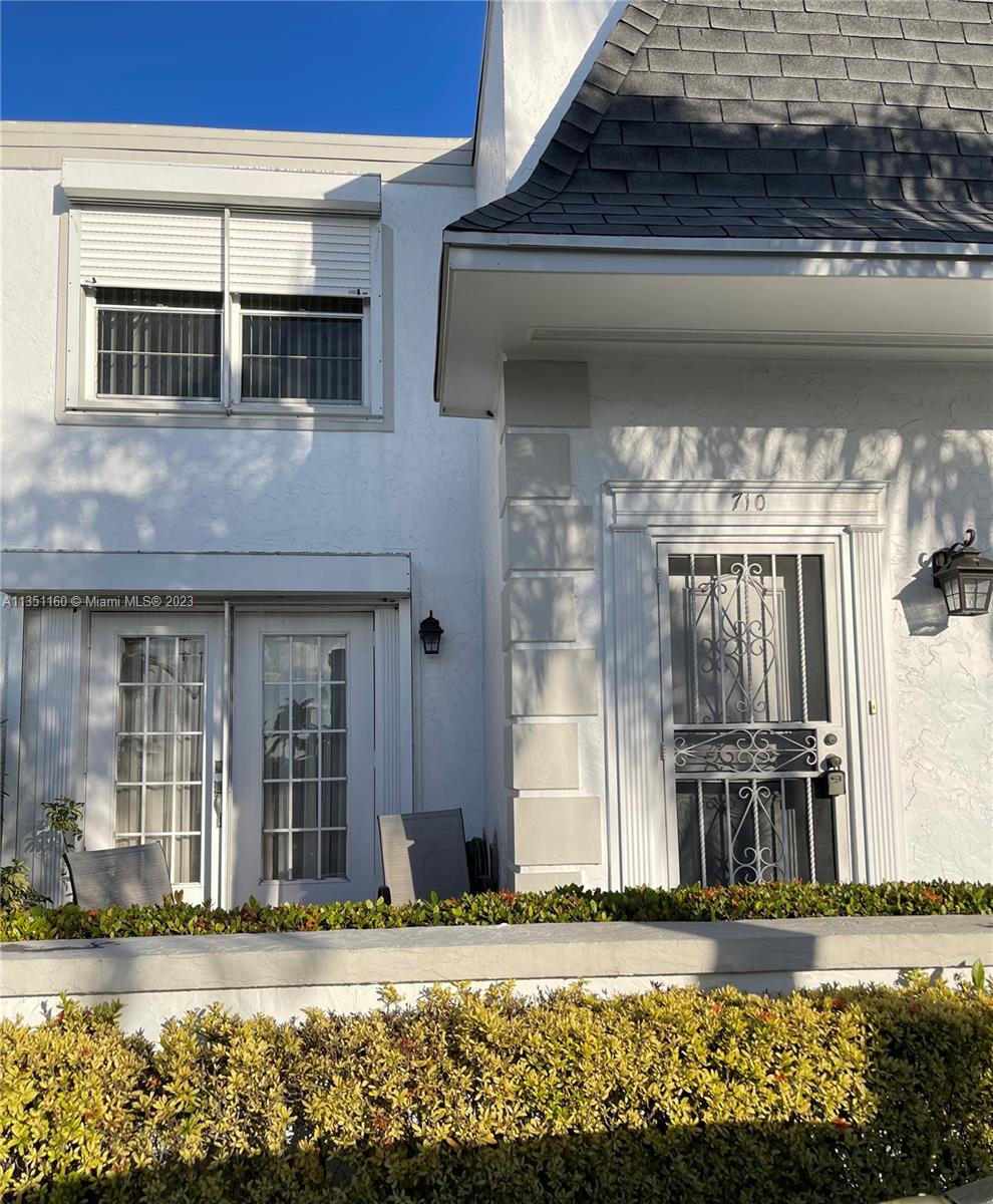This is an amazing opportunity to own in East Hallandale Beach. This home is conveniently located in a family and pet friendly neighborhood. Walking distance to shopping, houses of worship, Hollywood & Hallandale beaches. Close to major highways & nightlife. Beautiful joseph Scavo park is just a block away. Open space layout with oversized living room/dining room combination and kitchen/family room. Private fenced in backyard. Second floor has two master bedrooms with one of them having a balcony. The laundry is on the second floor. Hurricane shutters. 2 car spaces in front of house. Guest parking. Unit is sold AS IS! Renting permitted after one year. Community clubhouse with gym and mens/womens sauna as well as heated in ground pool & beautiful renovated tennis/pickle ball courts.