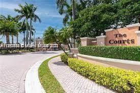 Excellent well-kept unit at The Courts with 3 beds and 2 fully bathrooms, NO carpet on floors, hurricane accordion shutters, open balcony and 2 assigned parking spaces. Gated community with 24/7 security, pool and children's playground. Centrally located close to schools, shopping centers and convenient access to the FL Turnpike. Electrical outlets hi-tech and bathrooms filters are no included,  Call agent, a must-see Condo.    Seller needs to stay to May 15th.