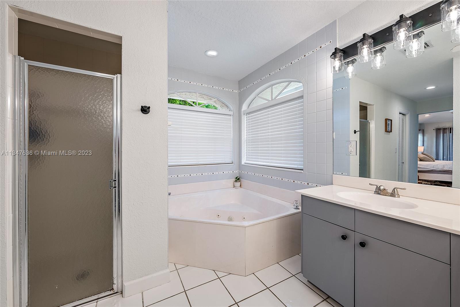 Primary Bathroom with dual sink​​‌​​​​‌​​‌‌​‌‌​​​‌‌​‌​‌​‌​​​‌​​ vanity