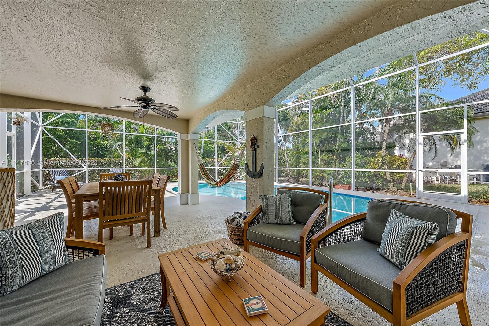 Front entry view shows Dining area, Living room, and staircase to 5th Bedroom suite.