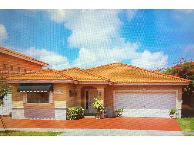 Photo 1 of 14542 88th Pl in Miami Lakes - MLS A11351069