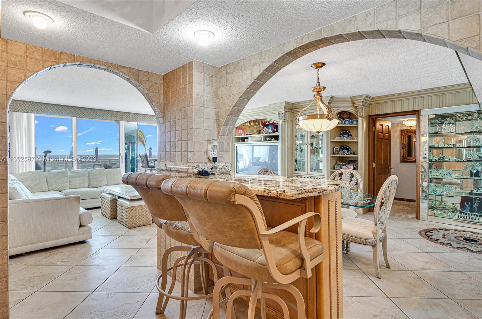 Tiled archways in kitchen