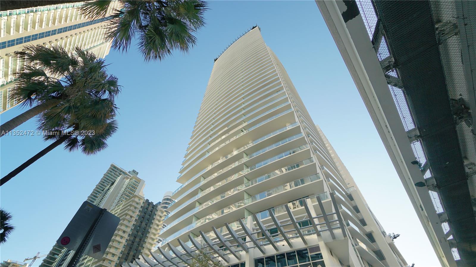 Large 1 bedroom 1 bath residence with beautiful views of Miami skyline. 9 FT ceilings, European cabinets in kitchen, stone countertops. Spacious bathroom with glass shower and tub. Porcelain floors (wood like) throughout. First class amenities: concierge, fitness center, theater, lounge, roof deck with infinity pool, recreation room, 1 parking space (valet only)