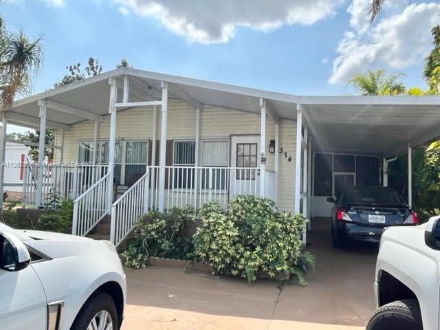 3/2 large Manufactured home. This home needs TLC, but has great potential to create instant equity for end user or investor. Plenty of parking for multiple vehicles, laundry room, storage area and carport. Community offers Clubhouse and Pool. Boat storage area also available. Small Assoc. fee of $81/M.. Close to Outlet Mall and just minutes from the FL Keys. Last comparable sale sold for $245K. This is a 55+ Community. CASH ONLY.