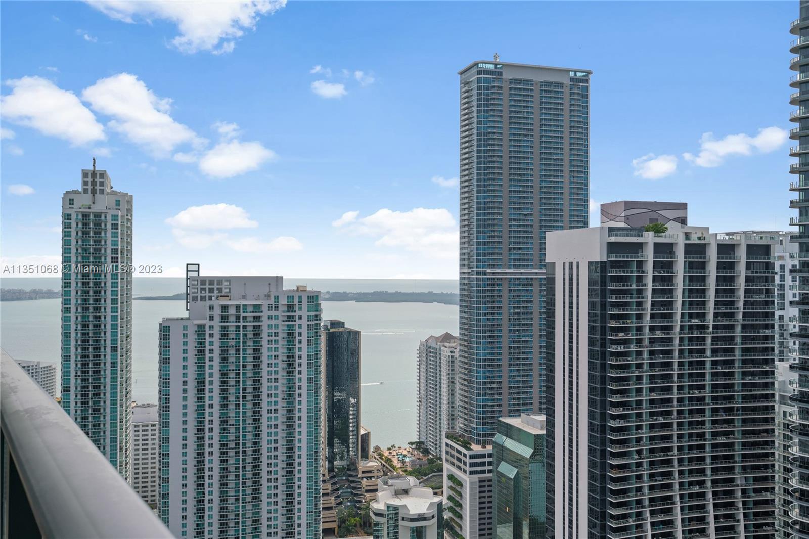 This Lower Penthouse at Brickell Heights East Tower is an exquisite residence, featuring 3 bedrooms and a convertible den, 4 full bathrooms, and breathtaking views of Biscayne Bay and the Miami skyline. The floor-to-ceiling windows allow for abundant natural light and showcase the expansive balcony. The residence also includes 32 x 32 porcelain tile, a spacious laundry room, and 3 parking spaces. You'll enjoy the convenience of being within walking distance to Brickell City Center and a variety of top-rated restaurants and shops. Live in luxury and experience the best of Miami's city lifestyle. UNIT COMES WITH 2 ASSIGNED PARKING SPOTS AND 1 VALET.