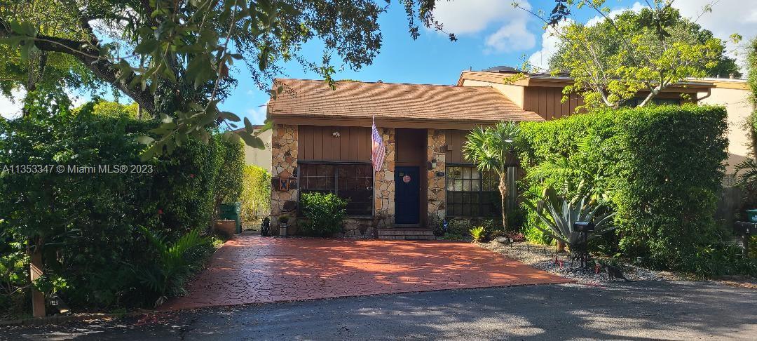 This Home is a unique distinct corner unit; 2 story townhome in the Kendall area, has 3 entrance to the gated Comm. of Chestnut Woods. Very centrally located. featuring a total of 4 rooms/2 full baths plus a room (9'x 9'sqft) office space looking out to the patio. Two Master room in the 1st floor. One bathroom has access to the house as well. This home has a circular stair leading to the upstairs area. Lots of wood for a cozy cabin ambiance. High ceiling Home(18') ; driveway is ample and stamp concrete. Patio has storage shed made with wood, canopy tent w/electricity and fan. Maintenance $63 a month. Comm. has 2 pools, clubhouse, brand new children's playground and tennis. Application, Rules & Regulations and By Laws attached. Thanks