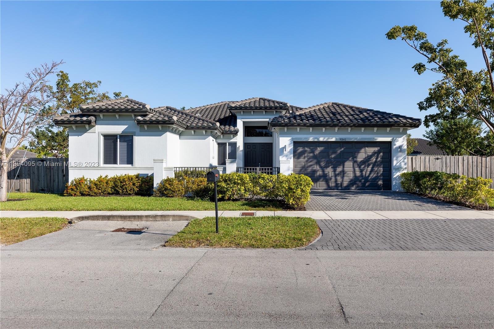 Welcome home! This beautiful & modern 4bed/3.5bath Palmetto Bay Estates home rests on a large magnificent lot. This is a newer construction home built in 2017 & with only 1 prev owner! The primary bedroom has 2 walk-in closets, with the 4th bedroom converted into the primary closet of your dreams! The layout of the home welcomes you with a vaulted ceiling entry & splits into 2 sizeable living/dining spaces that are separated by the center set kitchen. Natural light runs through the home reflecting beautifully off the porcelain tile floors & soaked up by the muted grey walls, creating the perfect ambiance. The fenced-in yard has an entry on both sides, one with a double door making way for larger items like a boat, trailer, RV, etc. It's time to make your dream home a reality. Welcome home.