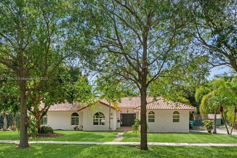Large updated luxury 1 story pool home in Prestigious Palmetto Bay Area,  large updated master bedroom with sitting area, luxurious bath, separate shower, tub, bidet area, big kitchen overlooking pool/patio area, vaulted ceilings, impact windows, 4 bedroom 3 bath, warm and inviting house with side car garage for privacy, lushly landscaped back yard, private, nice floor plan, double door entry, light and bright home.