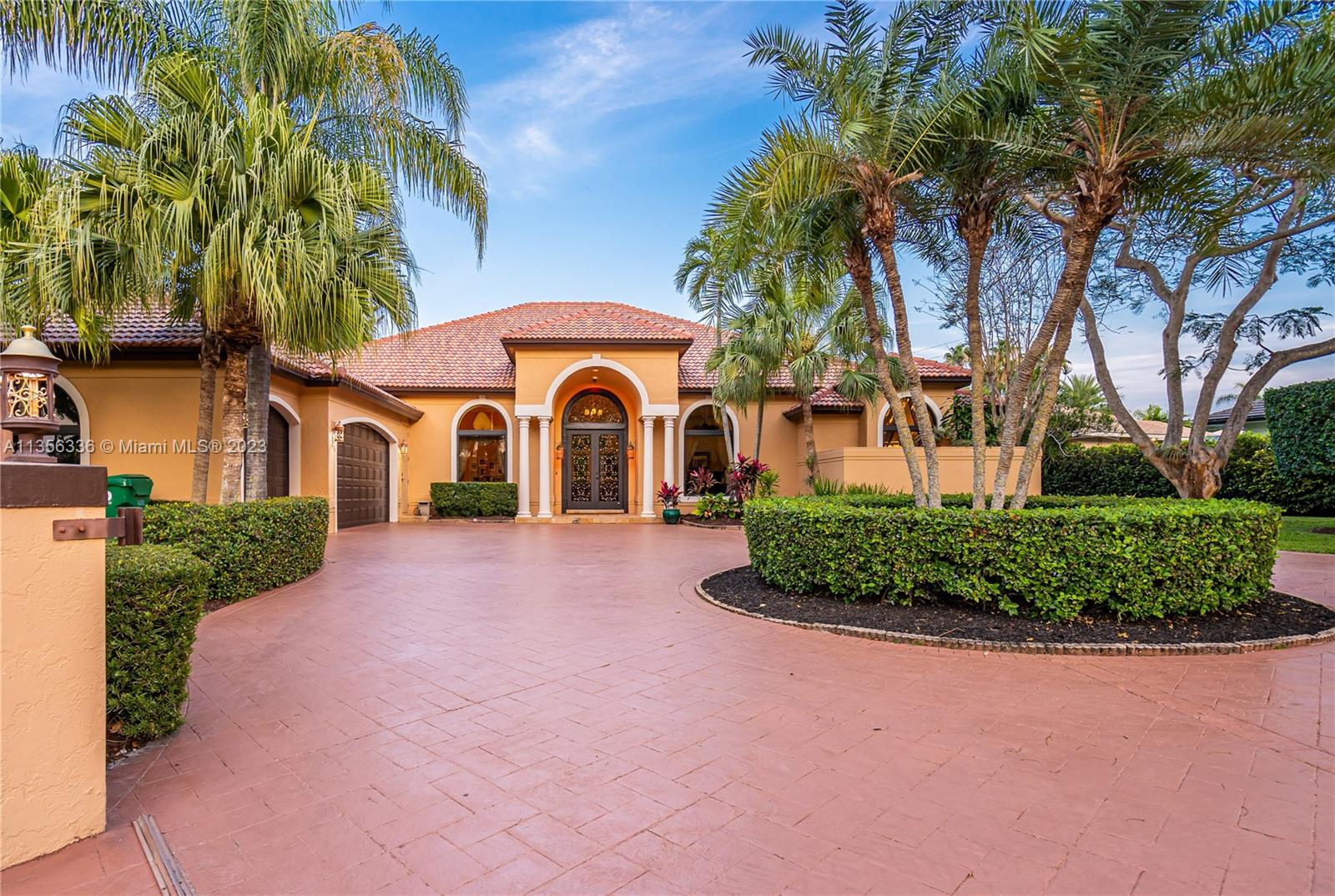 Contemporary Mediterranean with great scale/style - vaulted tray ceilings - 8’ solid core 4 hinge doors. Gated entry, circle driveway to 3 car garage. Security/privacy with 7 ft. concrete wall surrounding this 4BR/3.1BA home. Ideally located in quiet neighborhood, only 6-minute walk to Starbucks, fine Italian restaurant, Deering Estate, gas stations and Dixie Hwy 2 miles. Excellent floor plan with perfectly scaled rooms and marble/wood floors throughout. Gourmet kitchen opens to billiards room, bar area and expansive family room overlooking tropical heated pool. Fabulous primary suite with French doors to spectacular outdoor living spaces. Move-in ready with new Mediterranean tile roof, new hurricane windows and doors, new 3-AC, indoor/outdoor are freshly painted...an exceptional property!