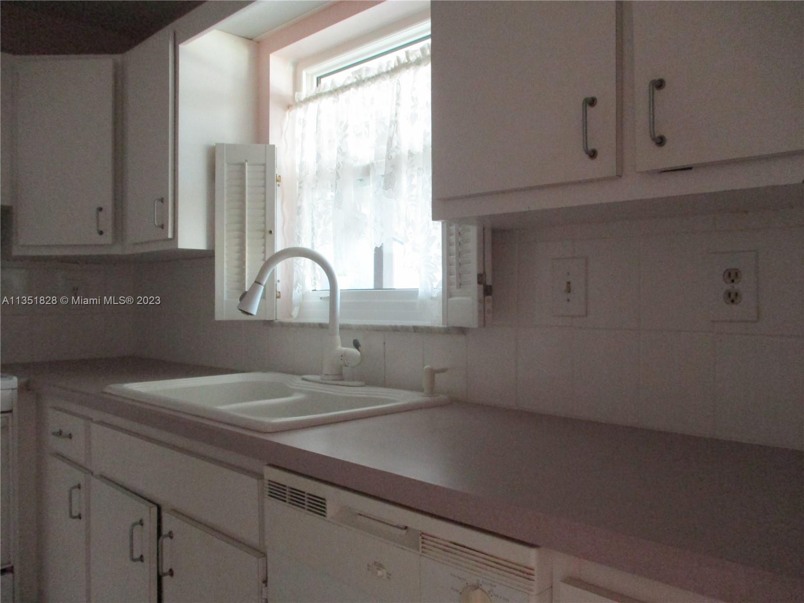 KITCHEN WITH WINDOW & DOUBLE SINK