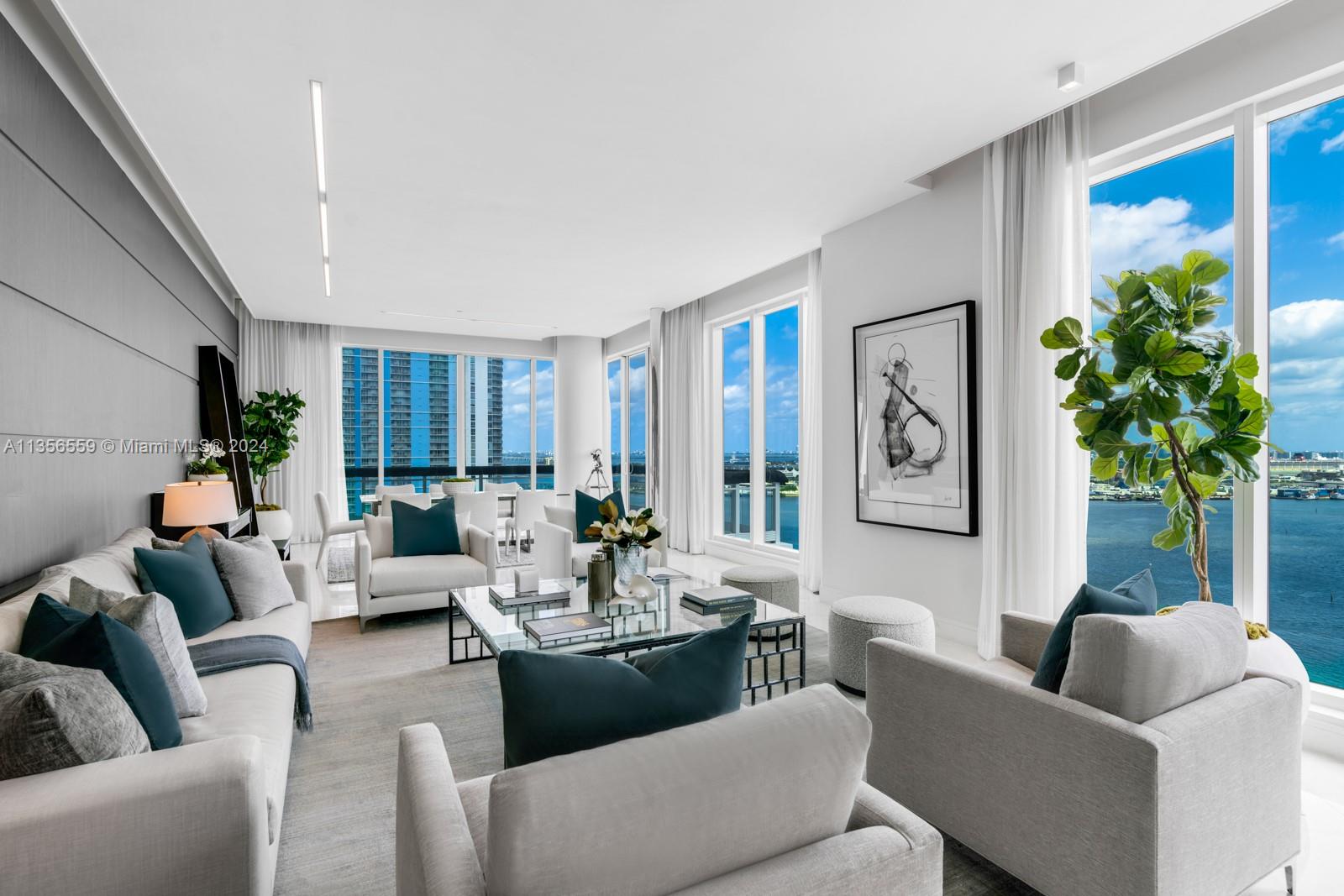Step Inside With Me! Welcome to Asia - Brickell Key’s premier address. The coveted '03' line is the largest floor plan in the building and offers spectacular NE water views of Biscayne Bay and Downtown Miami. This unique home in the sky features soaring 10’ ceilings, 4 bedrooms + staff suite, 5.5 baths, ample storage, marble flooring, Miele appliances, and custom millwork throughout. The grand primary suite offers unobstructed views, sumptuous spa bath, large balcony, and a tremendous walk-in closet. This well-designed floor plan includes an ample Media/screening room and flex space to be used as a gym. Enjoy the Asia lifestyle with amenities such as 24-hour concierge service, complementary valet, beautiful fitness center, spa, and racquet ball court.