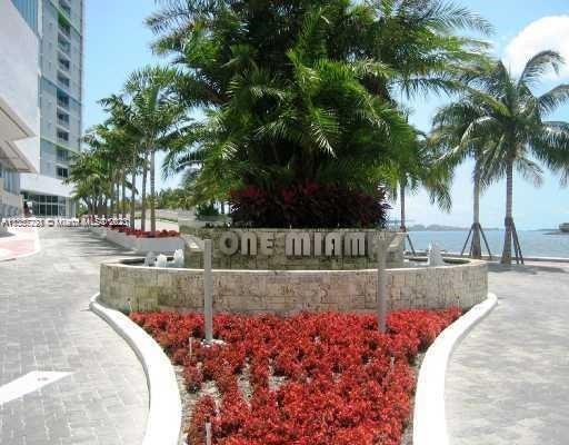 1/1 with direct views of Biscayne Bay and Miami Skyline in One Miami. New living room flooring.  5 stars amenities. Granite counter-tops and stainless steel appliances along with marble counter-top bath and walk-in closet and wood laminate throughout.  Unit is just painted.  Building amenities include 2 swiming pools, Jacuzzi, Sauna, 2 Fitness Centers, Convenience store and 24 hours concierge, security and valet.  Walking distance from Miami Arena.  At the entrance of Brickell .  Washer and dryer in the unit.  SEE BROKERS REMARKS FOR SHOWINGS (YOU HAVE TO SEND AN EMAIL FOR FRONT DESK ACCESS) READ BROKERS REMARKS WHERE TO SUBMIT OFFERS! UNIT IS SOLD AS IS.