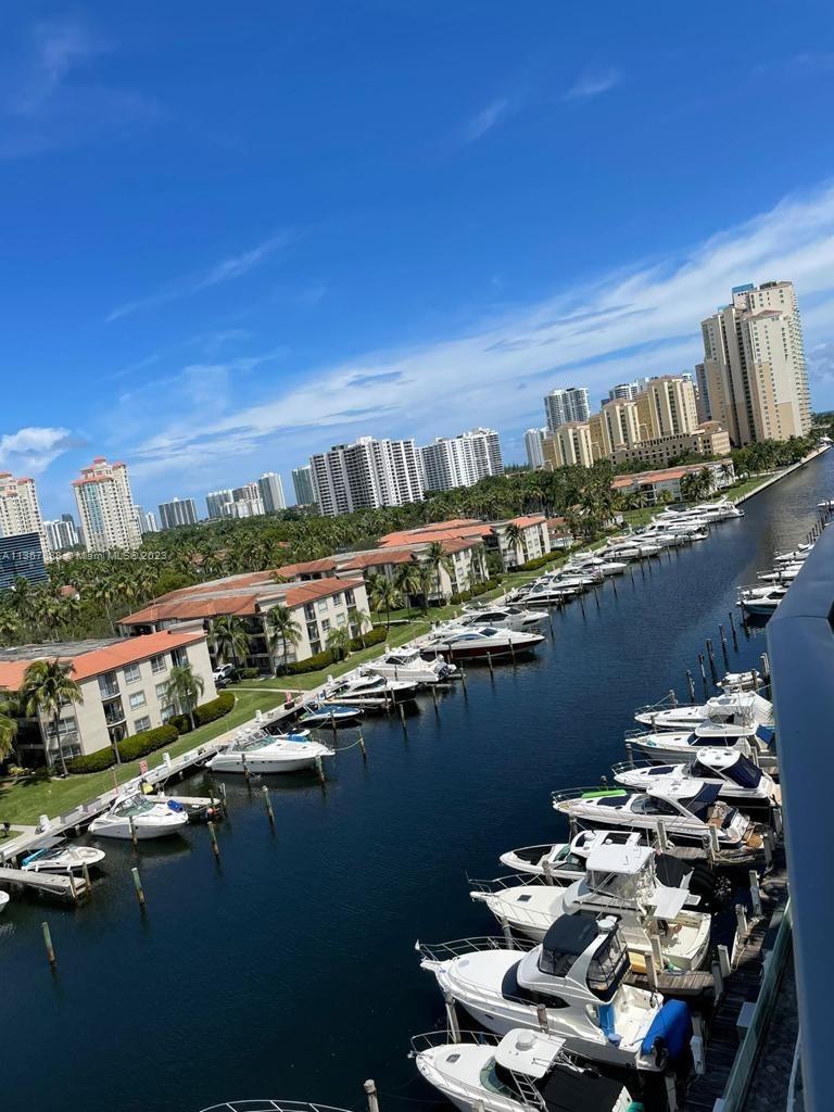 Nice 1 bedroom plus den, used as a second bedroom. 2 full baths. Nicely furnished, with porcelain floor and closets on both rooms. Building has full amenities, with tennis court, basketball court. SPA, swimming pool, party room. View to the marina. High ceiling, 12 feet. 1 assigned parking space.