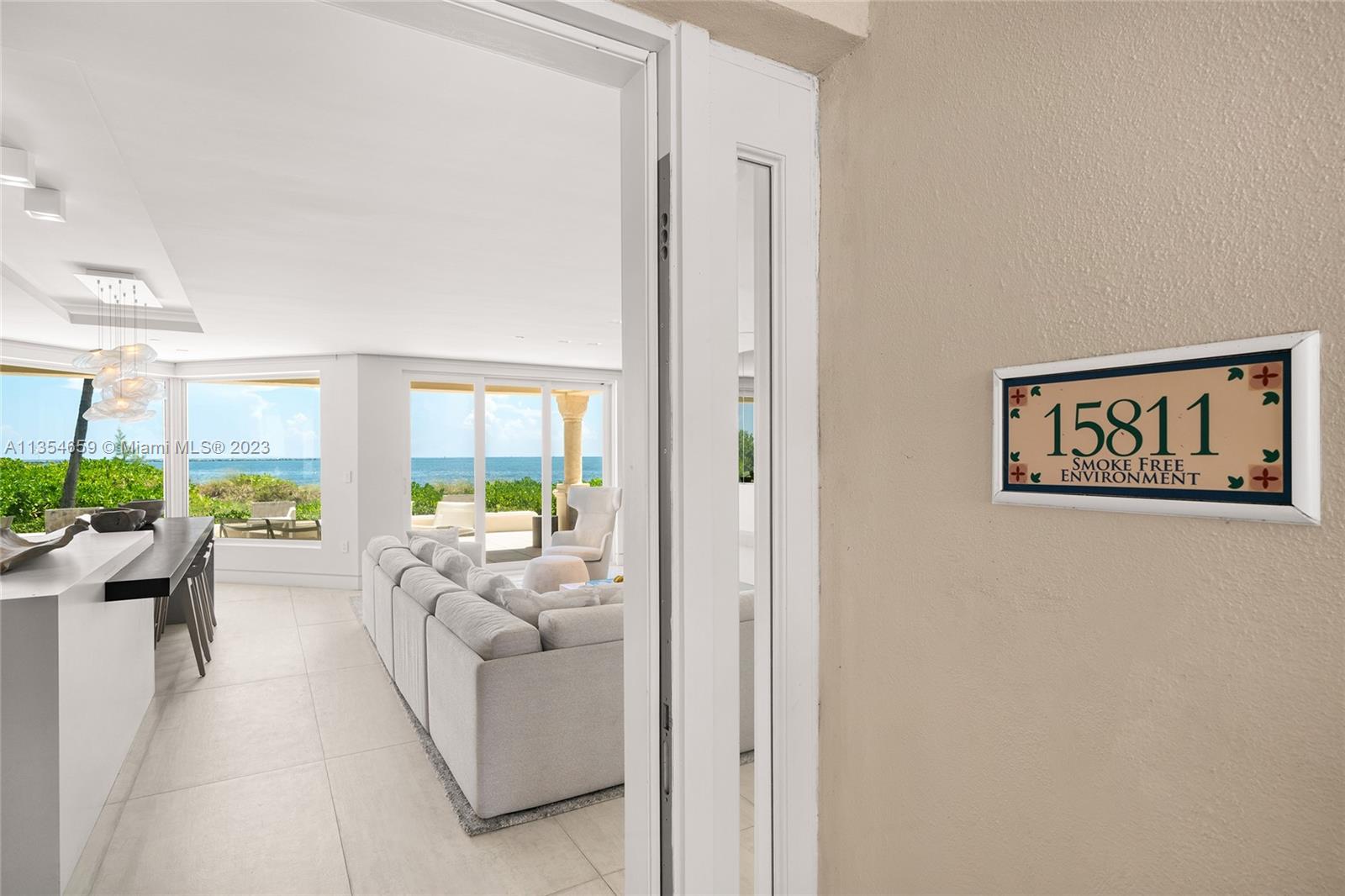Live in your own private island beach house just steps to the beach & ocean on the Southeastern tip of Fisher Island. Watch the sun rise from this chic modern unit that is being leased fully furnished, & turnkey. Open flow through living & dining layout, fine stone floors throughout, custom wall coverings, mechanical shades, smart home system & amazing ocean views from every angle. Sleek open chef’s kitchen with granite counter tops, top-of-the-line Miele and Sub-Zero appliances, eat in kitchen seating & custom cabinetry. Beautiful Oceanside principal suite w/seating area, walk-in closet, & elegant bathroom. 2 other bedrooms are each perfectly designed. Large covered wrapping terrace w/comfortable seating areas made to relax as you feel the ocean breezes from this incredibly unique unit.