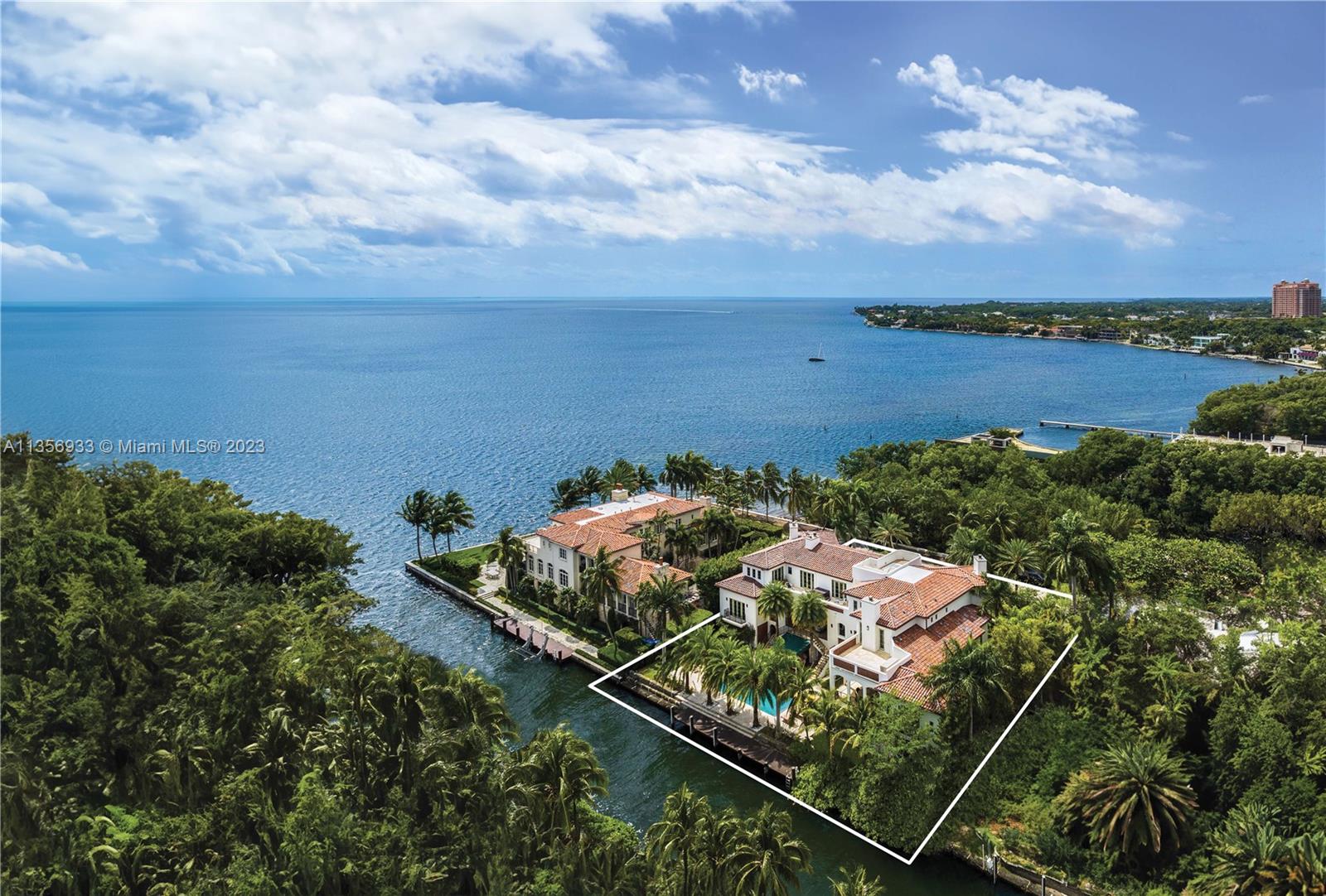 Located in the private guard-gated community “The Moorings”, this enchanting 17,873 total SF waterfront estate is in the heart of the most sought-after neighborhood in Coconut Grove. Every detail of the 7 BD/7+2 BA home was carefully selected and quality crafted. Multiple covered terraces provide a seamless blend of indoor and outdoor spaces with endless water views. A gourmet eat-in kitchen offers an exquisite, oversized island and top-of-the-line luxury appliances. The elegant primary suite features a sitting room, walk-in closets, and a spa-like bathroom retreat with a roman tub and fireplace. On 143 ft of waterfront, the home includes a pool, dock, direct access to Biscayne Bay, and a rooftop terrace with views of the Bay. In close proximity to the finest dining, shopping, and schools.